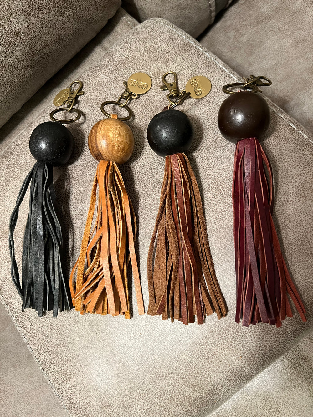 Brown bead with red/burgundy leather